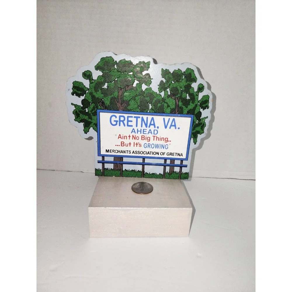 sign for the town of Gretna, Virginia shelf sitter vintage its growing